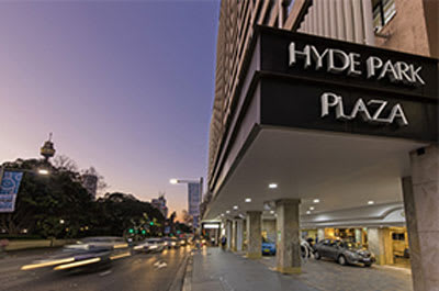 Exterior image of hotel with Hyde Park Plaza sign